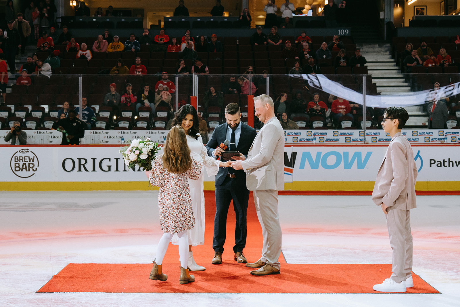 Kyle & Sarai Saddledome Wedding